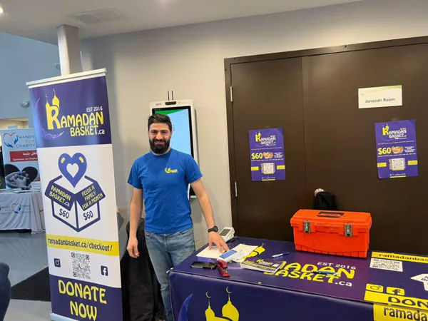 Children smiling with their Ramadan baskets